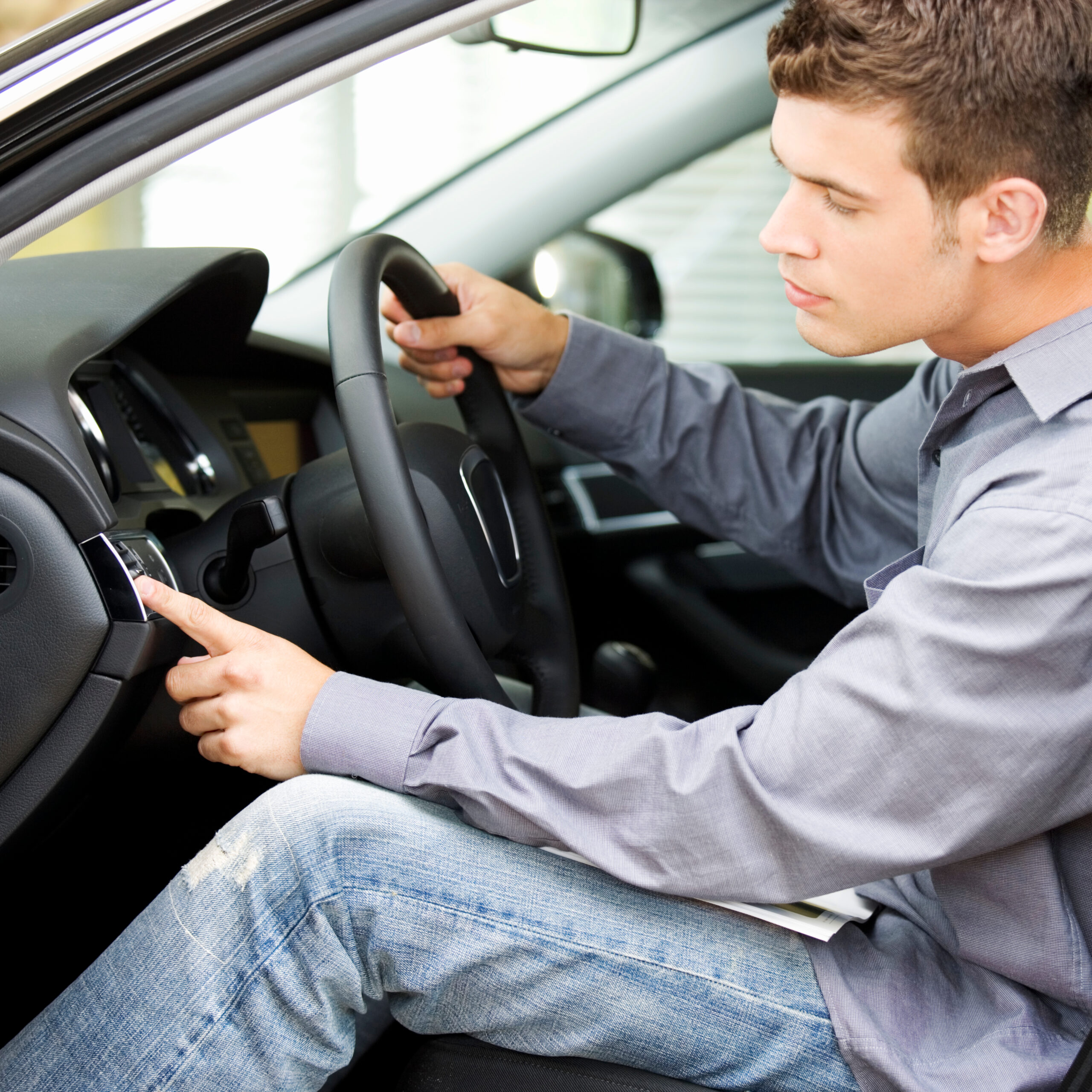 man-in-a-car-holding-steering-wheel-2026-03-26-09-18-33-utc